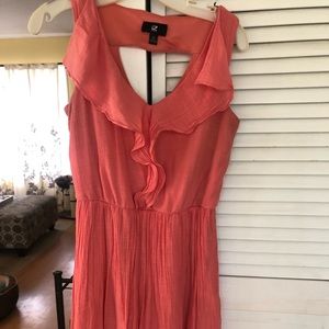 Bright fun and flirty coral ruffled dress